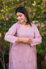 Side view of a pyazi pink Alfiya Mul Mul Self Set, showcasing comfy cambric cotton and Ghasspatti work.