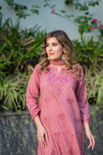 Angled view of an Alfiya Mul Mul Set, featuring a dyable Nazneen chiffon dupatta and Chikankari style.