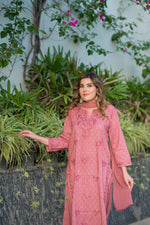 Full shot of a woman in an Alfiya Mul Mul Set, a stylish traditional outfit with Chikankari weaving texture.