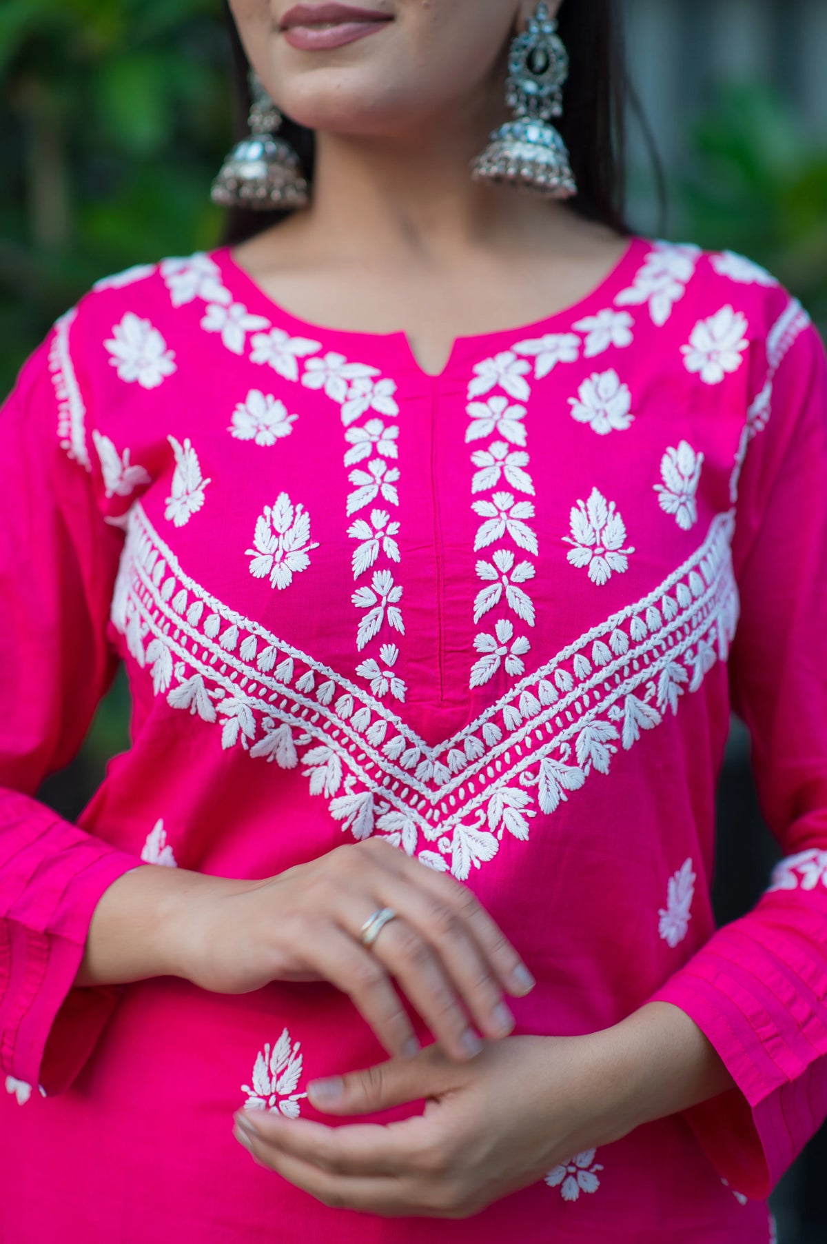 Front image of a Chikankari pink kurta for women in light cotton. Features floral embroidery & a comfortable fit.