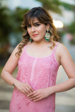 Close-up view of a pink Noora Noodle strap kurti, highlighting its simple, modern silhouette.