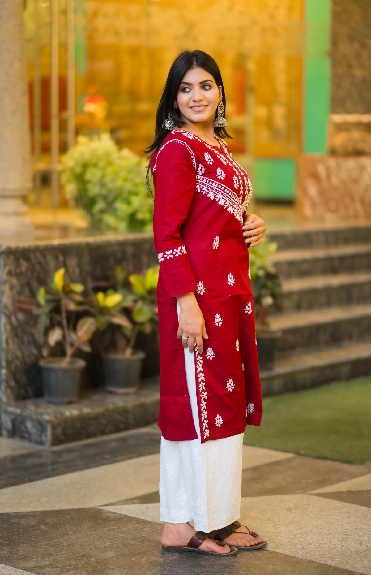 Side view of a woman wearing a Riwayat kurti, highlighting the fabric's flow and elegant fit.