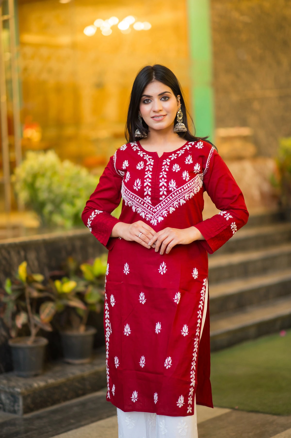 Full shot of a woman modeling a stylish Riwayat kurti, perfect for modern Indian fashion.