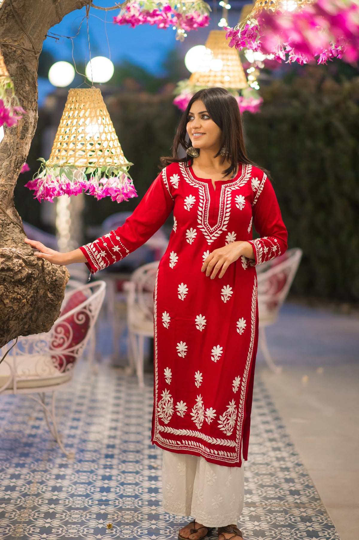 Red embroidered chikankari kurti with white palazzos festive ethnic wear for women.