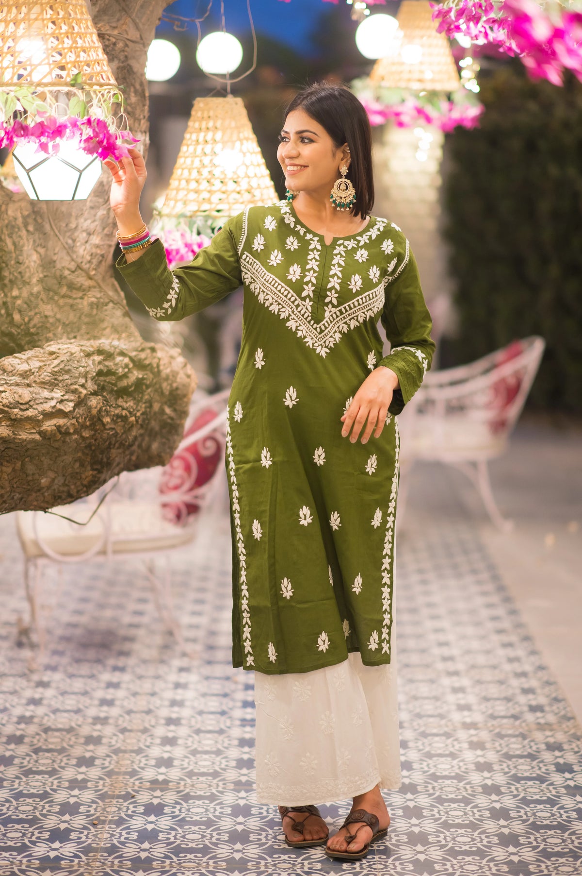 Side look of pastel green chikankari kurta with hand embroidery, stylish and breathable for casual or office ethnic looks.