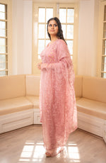 Side view Chic pastel pink organza salwar suit with draped dupatta. View light pink Indian wear, stylish.