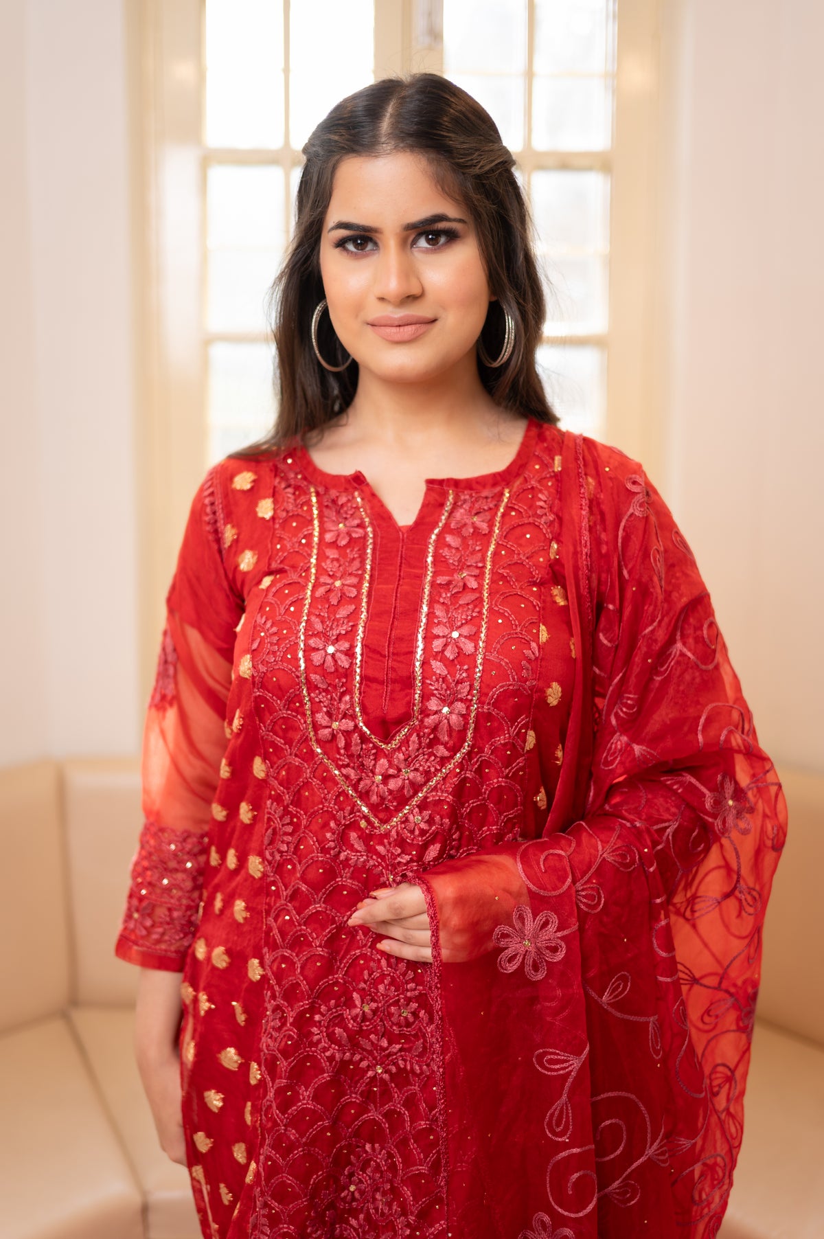 Front portrait Red Chikankari organza suit, latest design. View beautiful embroidery, perfect organza dress material.