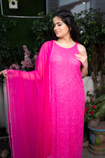 View a Pink Viscose Sleeveless Kurti (46-inch) with beautiful draping and Chikankari artistry.