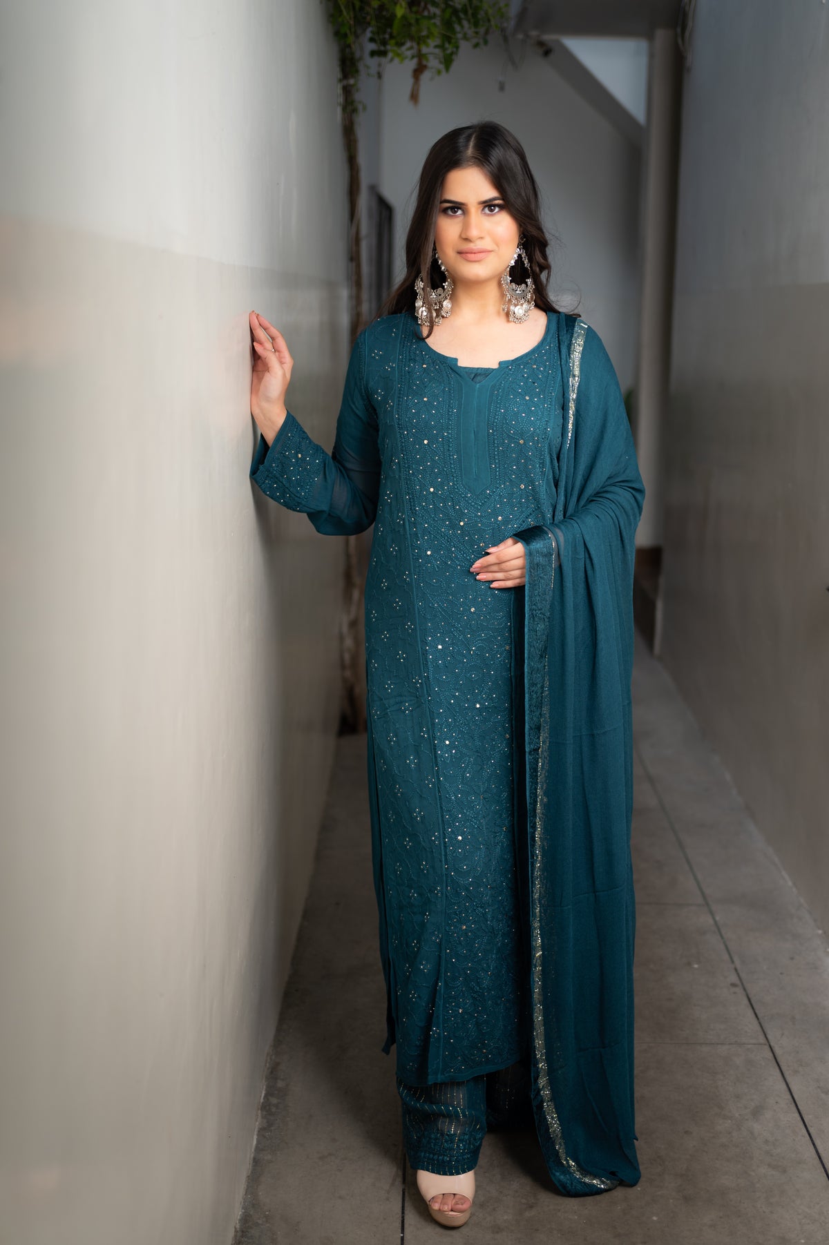 View an elegant Blue Viscose Set, a georgette kurta set with Chikankari and Mukaish handwork.