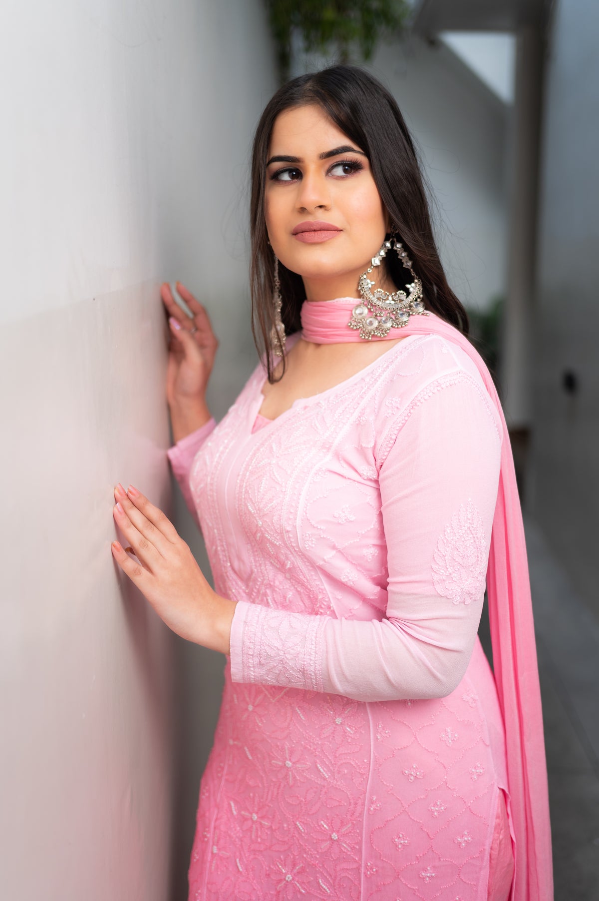 View a Pink Viscose Set (georgette kurta set) with beautiful draping and Chikankari artistry.