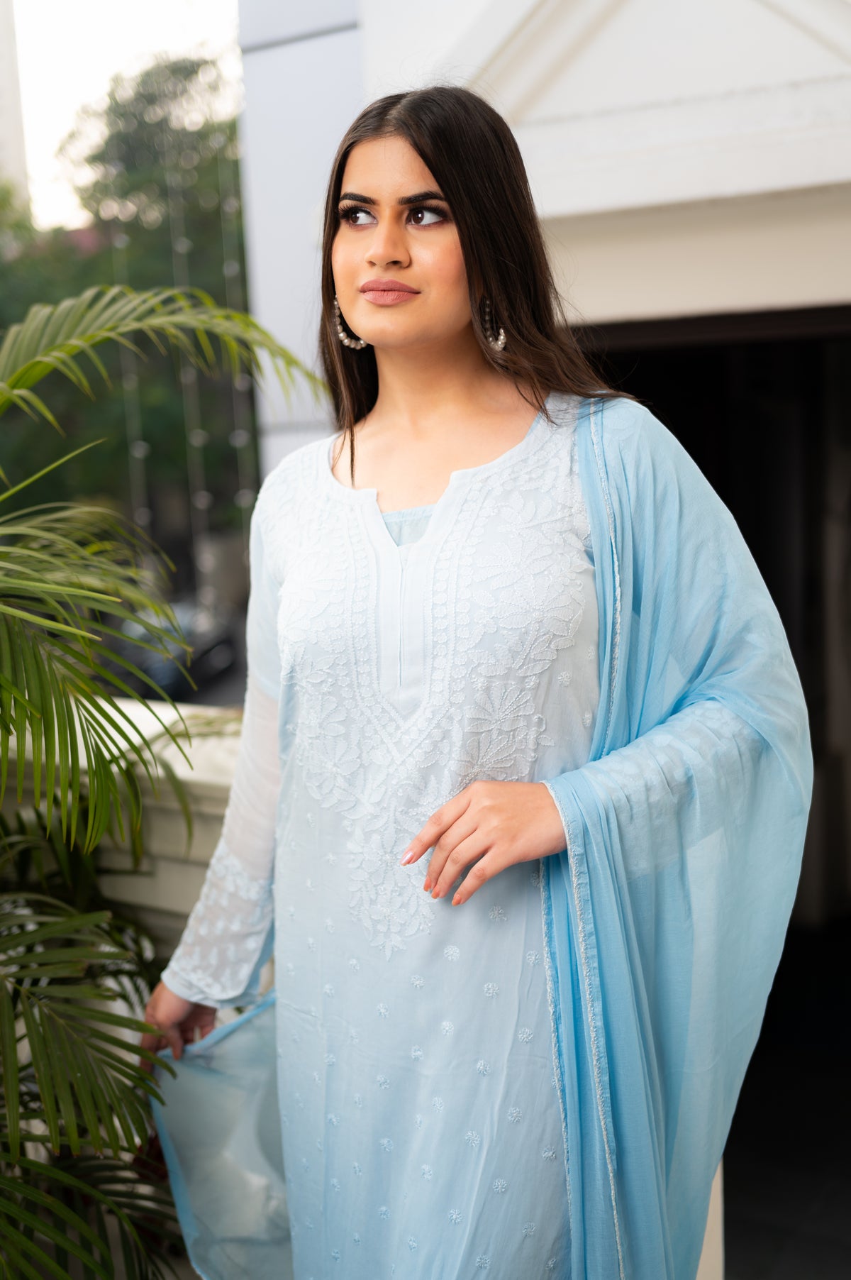 View an elegant Pure Georgette Kurti Set with traditional Lucknowi Chikankari design.