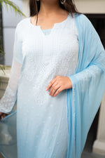 Close-up of intricate Chikankari work on a georgette kurti, showcasing Bhakiya and Phanda.