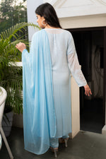 Detailed view of hand-embroidered Chikankari on a viscose georgette fabric kurti.