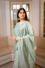 Close-up of dyable Modal Chanderi fabric in Green, with intricate Chikankari and Zari work.