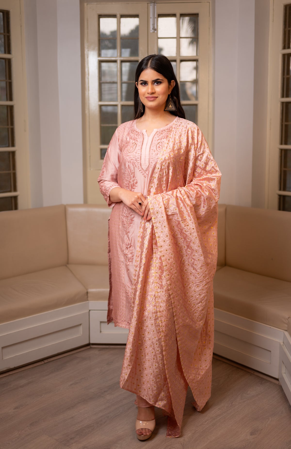 View a luxurious Pink Muslin Chanderi Kurti Set, featuring Chikankari and Zari Cut Dana.