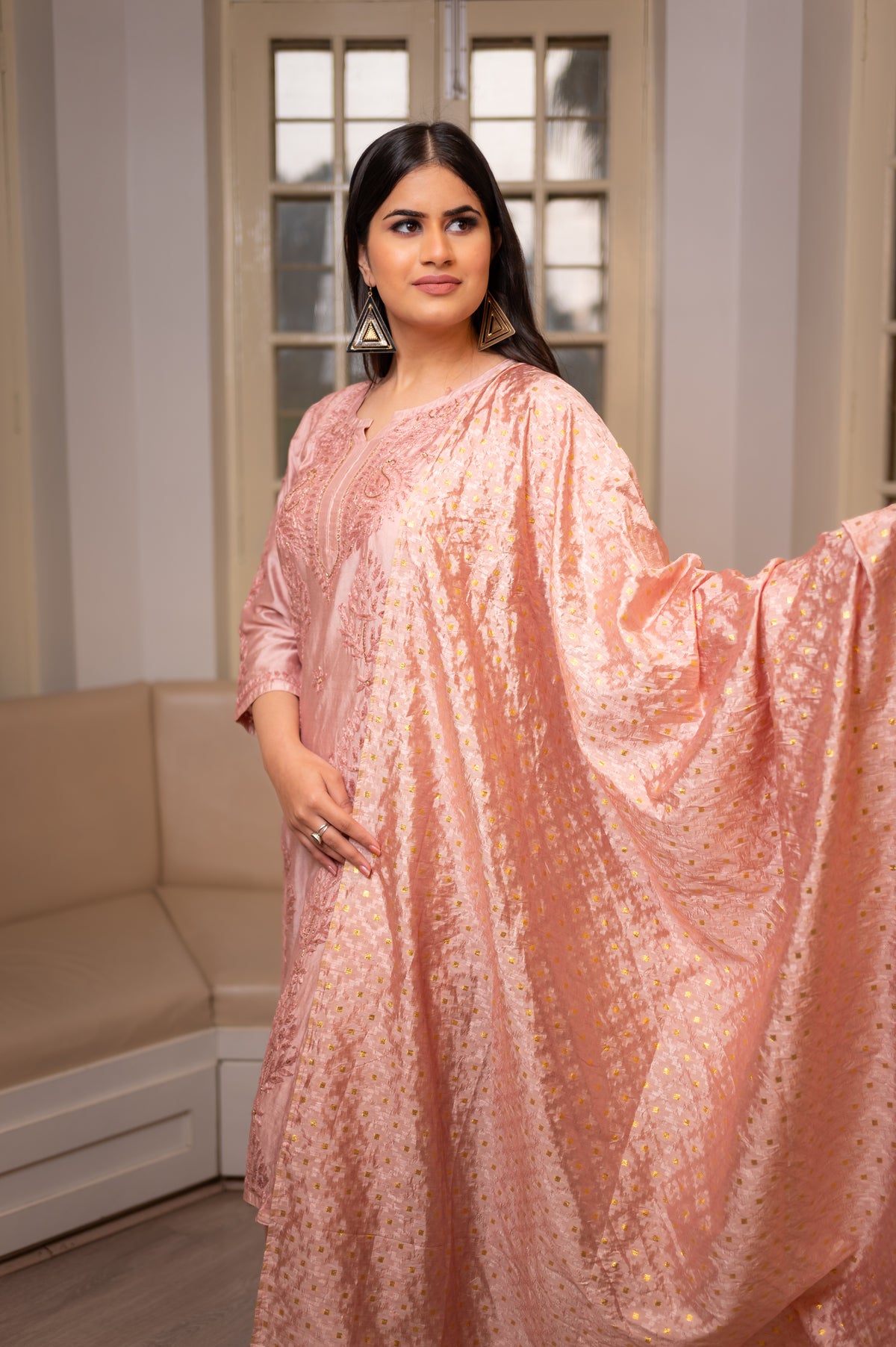 View a stunning Pink Muslin Chanderi kurta set, with elegant Chikankari and Zari work.