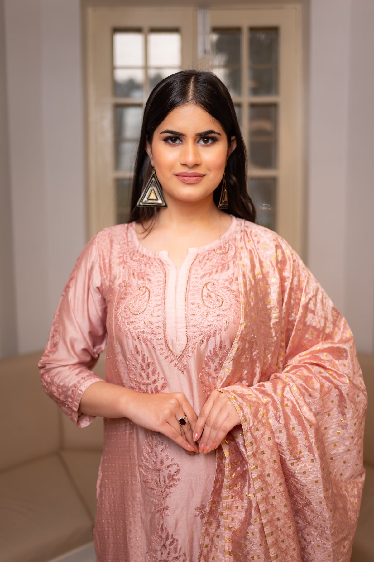A comfortable Pink Muslin Chanderi kurta set, with hand-made Chikankari and Zari work.