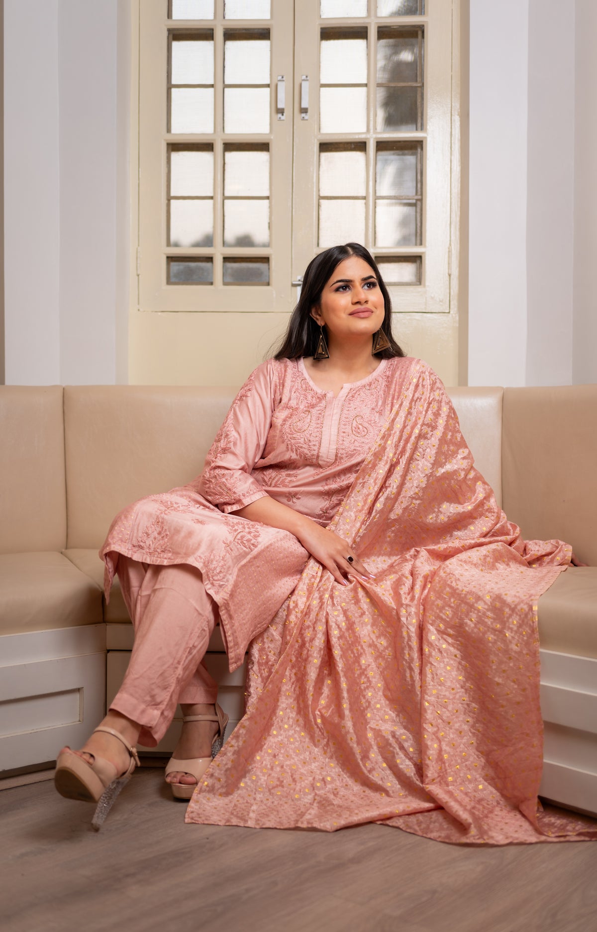 Detailed close-up of a Pink chanderi kurta, revealing exquisite craftsmanship and Zari detailing.