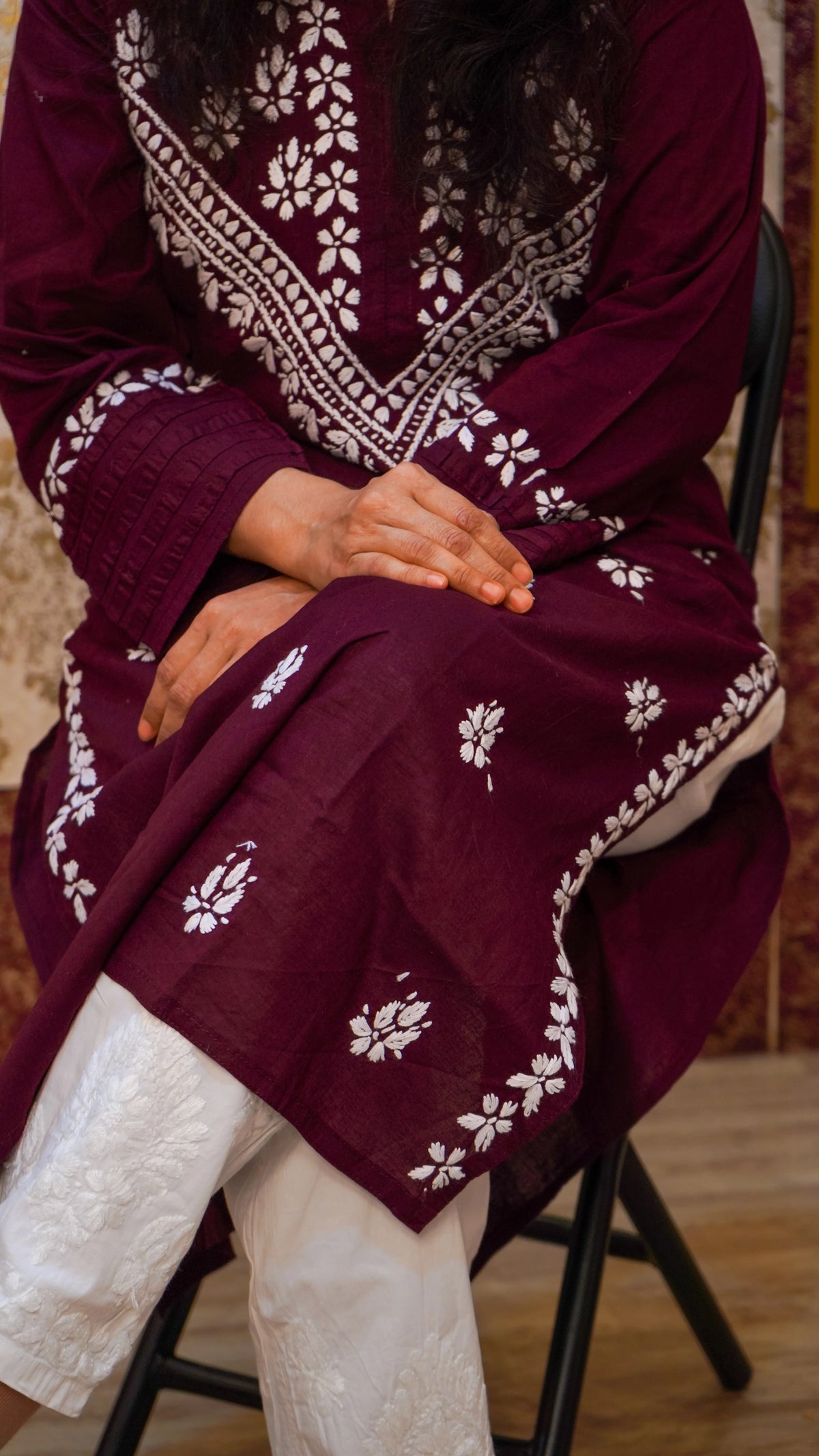 Close-up of Chikankari Ghasspatti handwork on a wine cotton kurti, Lucknowi craftsmanship.