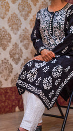Full shot of a black Chikankari kurti, 100% soft cotton with hand embroidery, ideal for ethnic wear.