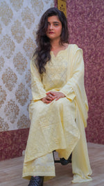 Front view of a model in a Hiba kurti set, showcasing hand-embroidered Chikankari with woven texture.
