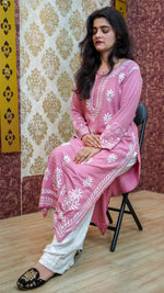 Side angle shot of pink rayon chikankari kurti with delicate white embroidery, ideal for elegant everyday ethnic outfits.