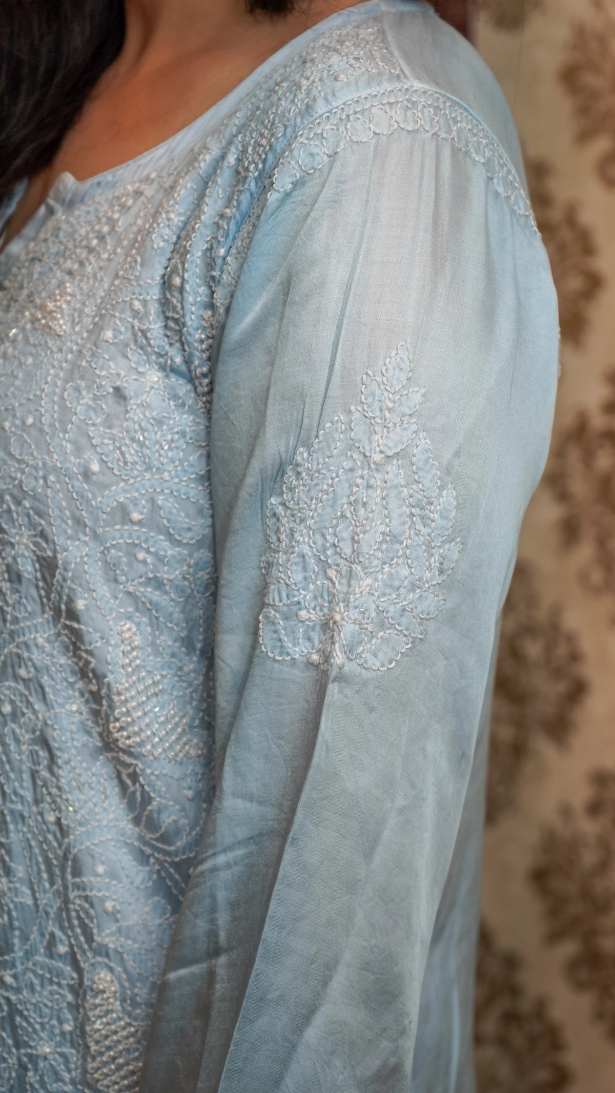 Side view of a sky blue Modal Satin Pearl kurti, an elegant ethnic wear with dyable fabric.