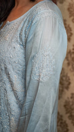 Side view of a sky blue Modal Satin Pearl kurti, an elegant ethnic wear with dyable fabric.