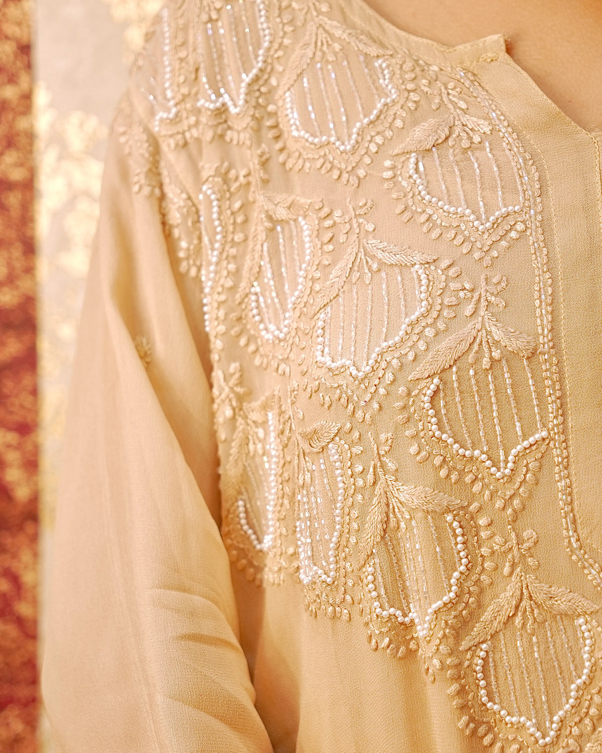 View the flowing georgette dupatta of a camel Viscose Pearl Chikankari Kurta Set. Elegant ethnic wear.