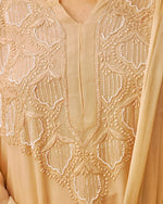 View the breathable viscose georgette fabric of a camel Chikankari Kurta Set, ideal for comfortable ethnic wear.