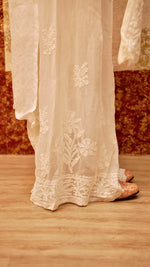 Close-up showing delicate Chikankari embroidery on a viscose georgette palazzo. View exquisite ethnic bottom wear.