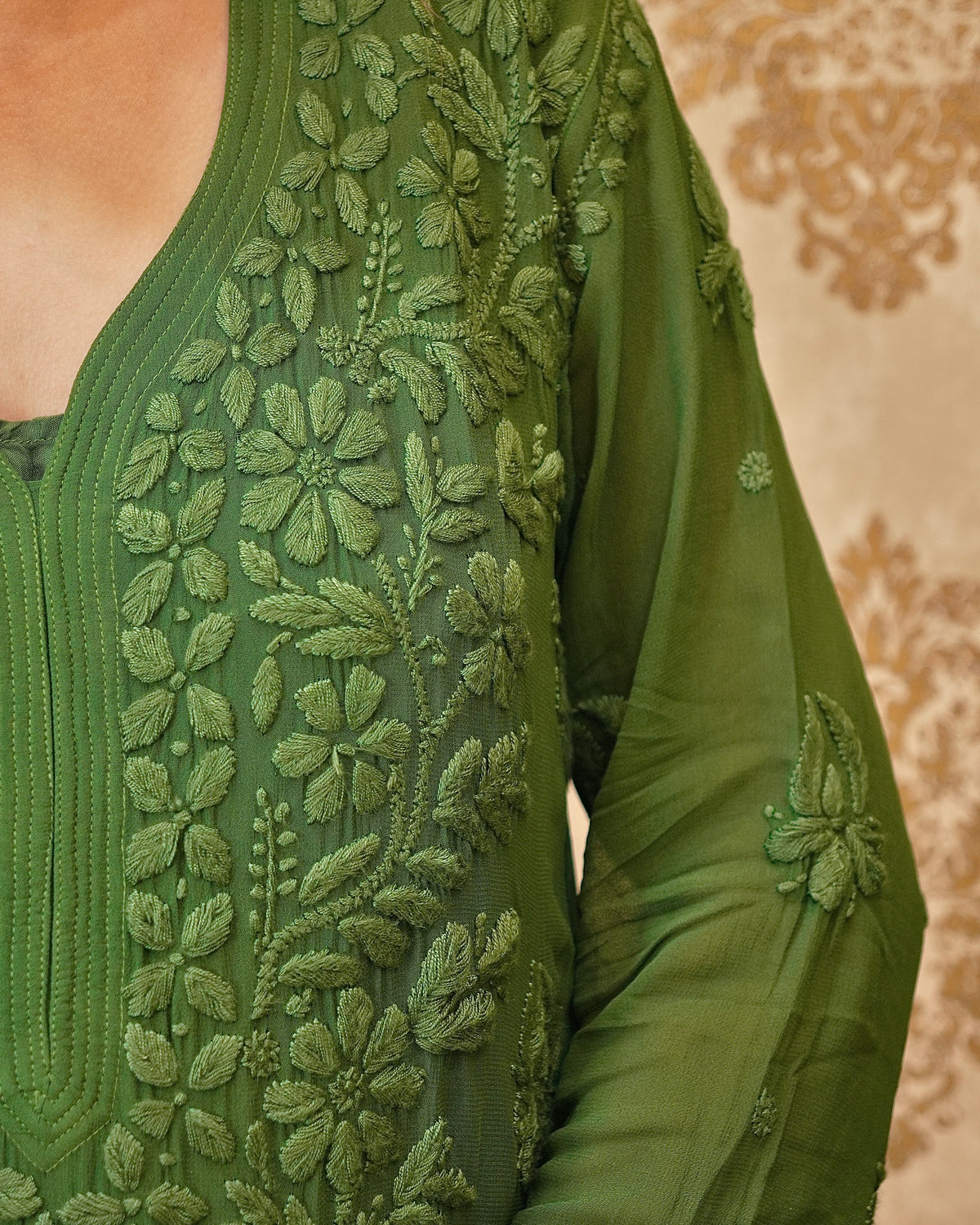 View a complete dark green Viscose 3D Kurta Set, with georgette kurti, pant, and dupatta.