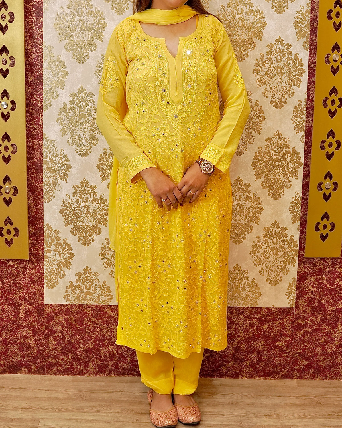 View the sheer georgette dupatta of a white Viscose Mirror Work Set. Adds ethereal elegance to the kurti.