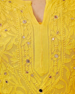 View a white Viscose Mirror Work Georgette Kurta Set, ideal for special occasions. Features hand embroidery.