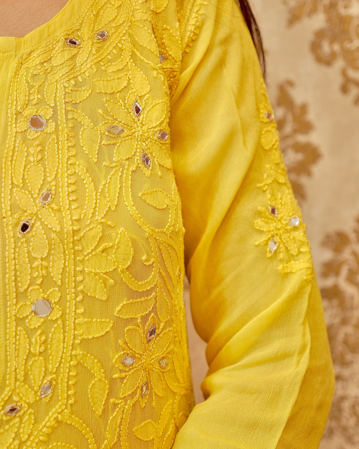 View a stunning white Viscose Mirror Work Set, a luxurious georgette kurti design for ethnic wear.