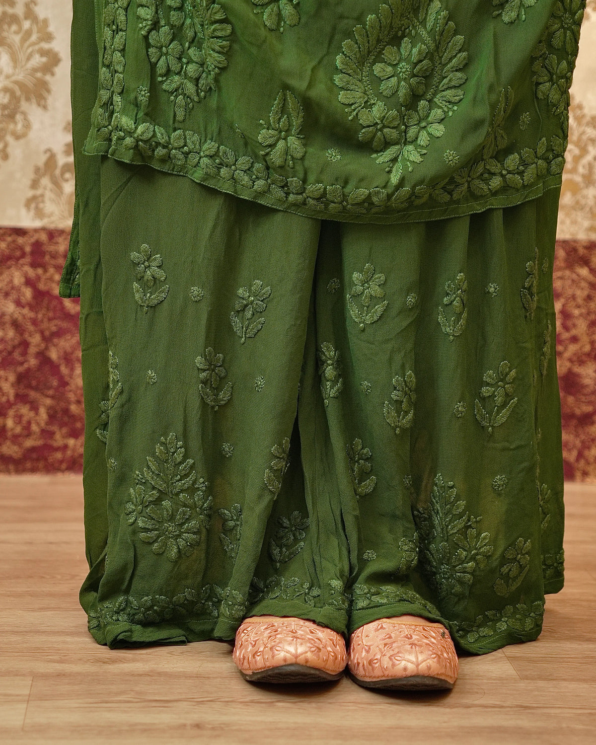 View the flowing georgette dupatta of a dark green 3D Chikankari Kurta Set.