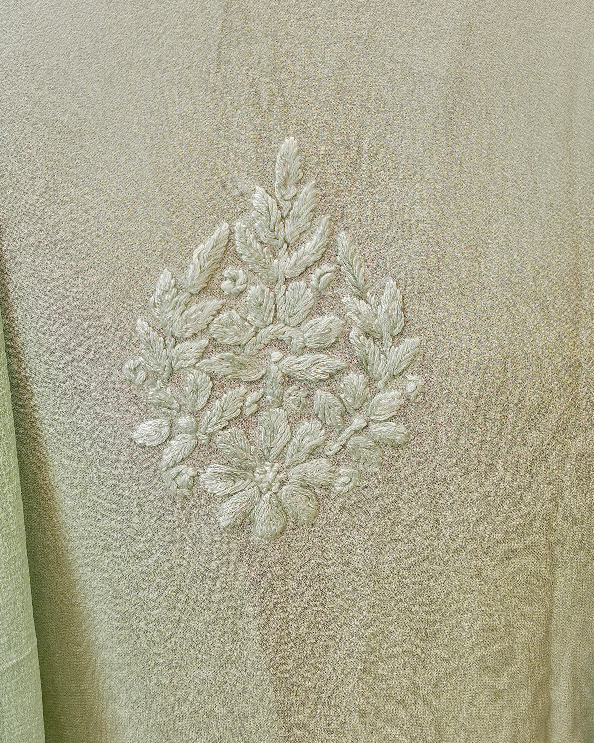 View the elegant drape of a green Viscose Georgette Chikankari Kurta with dazzling 3D embroidery.