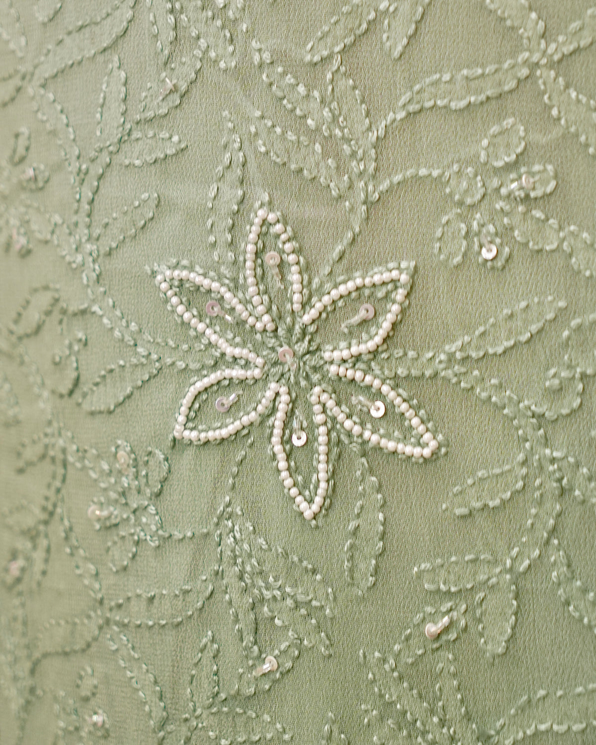 View a complete green 3D Viscose Moti & Chikankari Kurta Set in luxurious georgette fabric.