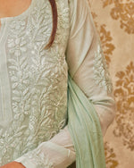 Detailed 3D Chikankari and zardozi embroidery on a green Viscose Georgette fabric. Pure viscose kurti.