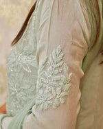 Close-up of green Viscose Georgette Kurti with 3D Chikankari, moti, sequins, and zardozi handwork.