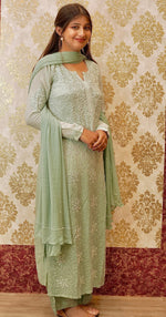 View a green 3D Viscose Moti & Chikankari Kurta Set. Features dazzling Zardozi and pearl embroidery.