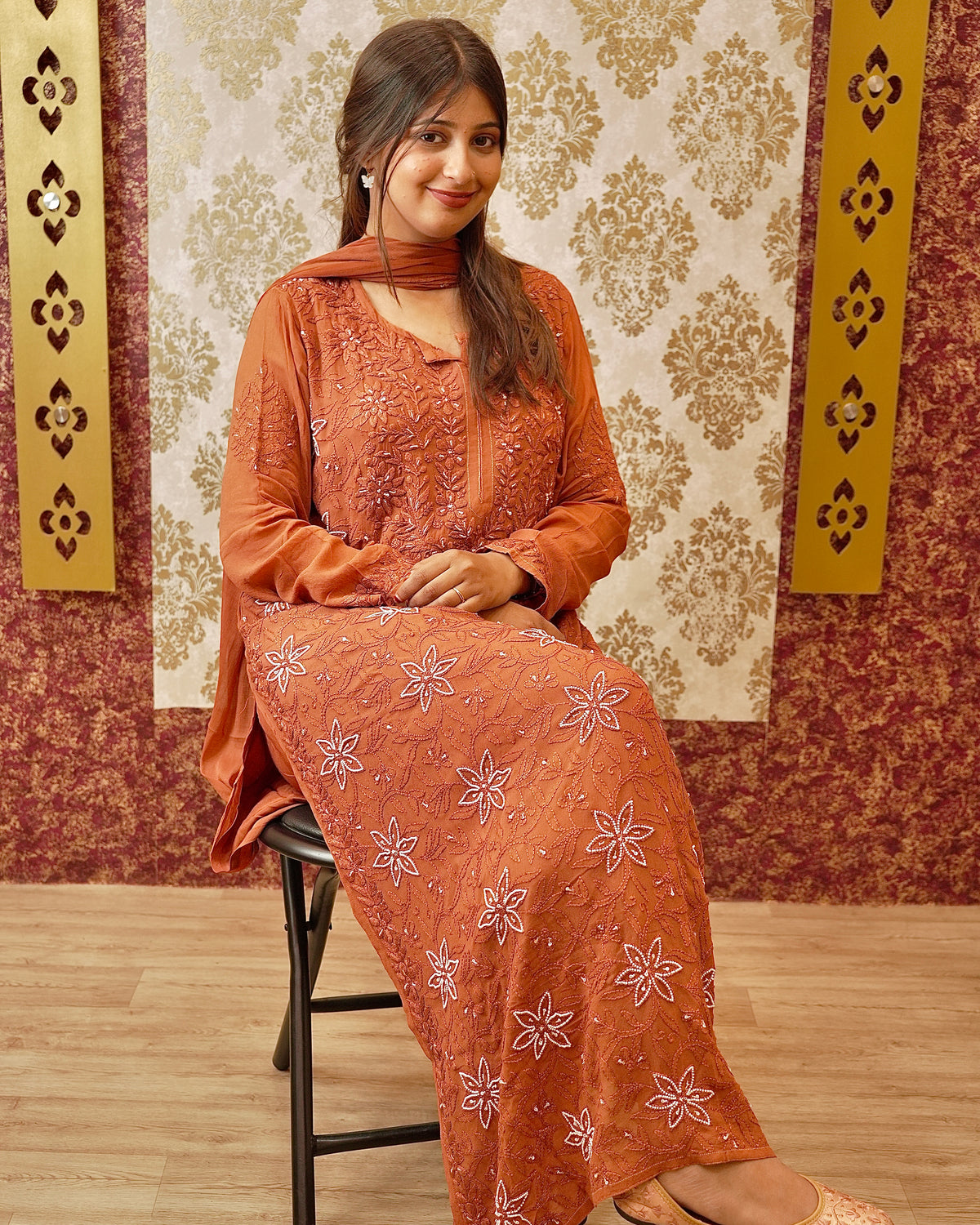 View an elegant orange Viscose Georgette Chikankari Kurta. Lightweight and breathable viscose fabric.