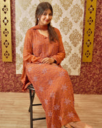 View an elegant orange Viscose Georgette Chikankari Kurta. Lightweight and breathable viscose fabric.