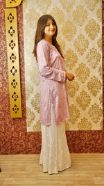 View a comfortable white Kali Palazzo, made from breathable Cotton Rayon. A versatile bottom wear for women.