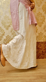 View the flowing silhouette of a white Kali Palazzo. Features original Lucknowi handwork, a comfortable bottom wear.