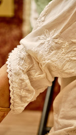 Close-up of the upper leg of a Tulip Pant, showing the exquisite hand embroidery and Cotton Rayon comfort.