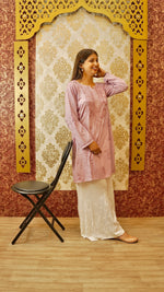 View an elegant white Kali Palazzo with original Lucknowi handwork. A comfortable bottom wear for women.