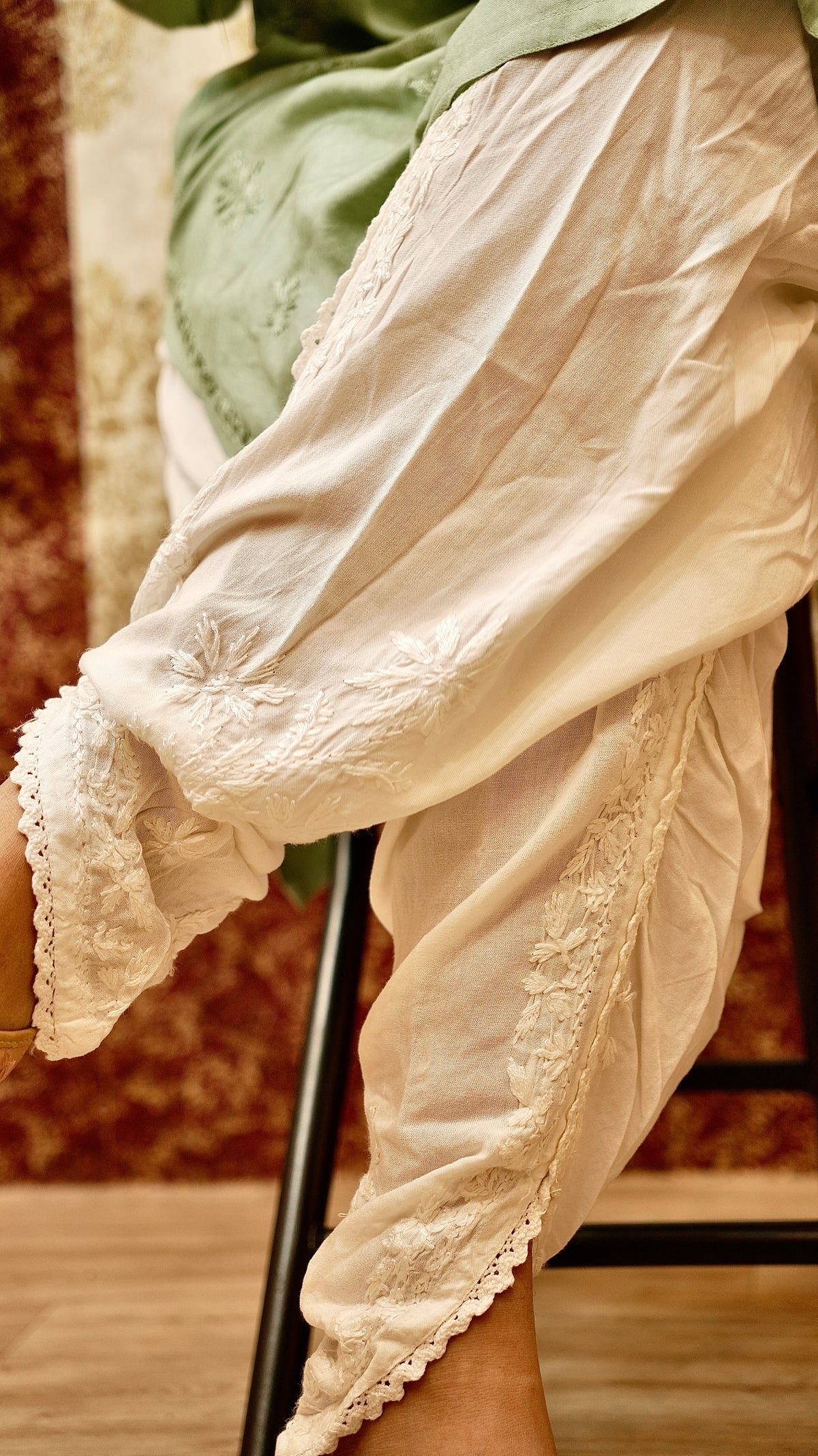 Side view of a comfortable Tulip Pant, displaying its unique shape and hand embroidery. Modern ethnic bottom wear.