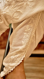 Close-up of the delicate hand embroidery on a Cotton Rayon Tulip Pant. A breathable and elegant bottom wear.