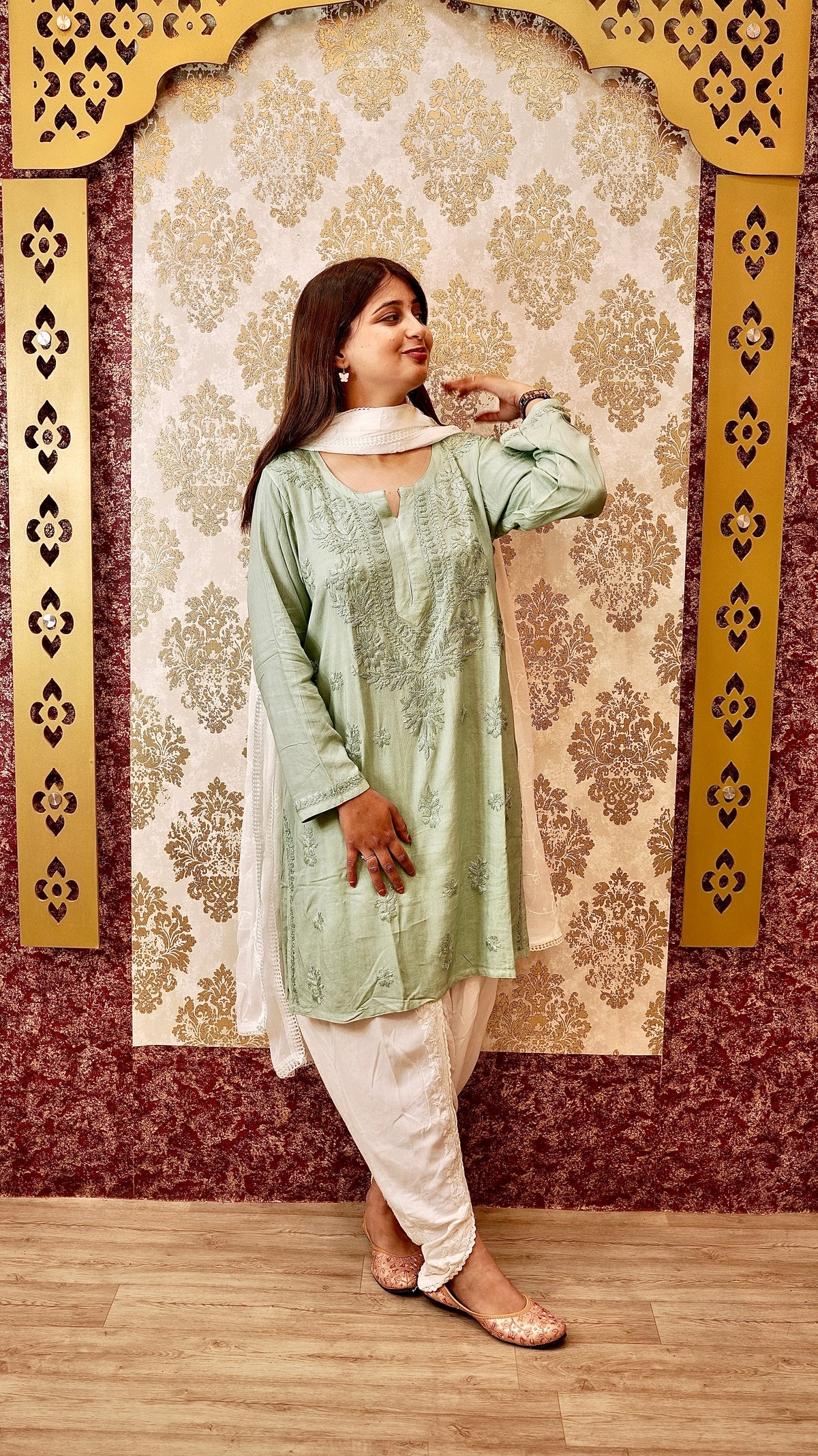 Full view of a person wearing an elegant Tulip Pant with hand-embroidered Chikankari. Stylish ethnic bottom wear for women.
